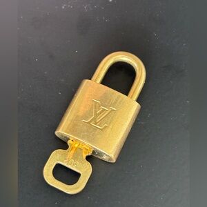 Louis Vuitton Gold Lock #302